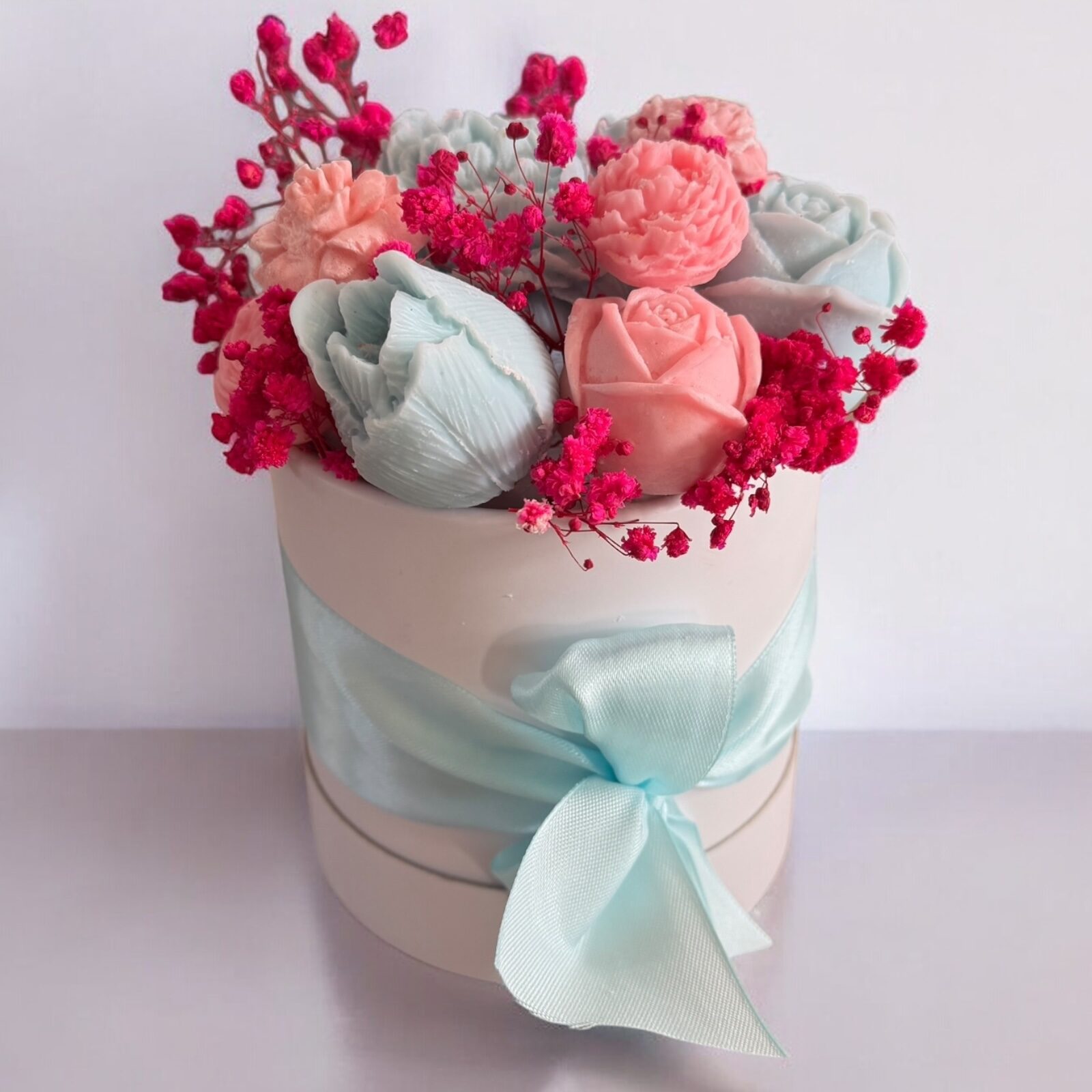 Bouquet fleur bougie rose bleu pastel